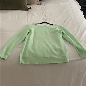 Amazon Basics green sweatshirt